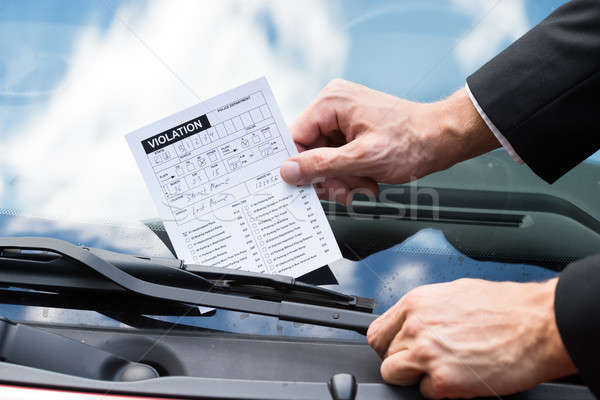 Parking bilet samochody przednia szyba człowiek Zdjęcia stock © AndreyPopov