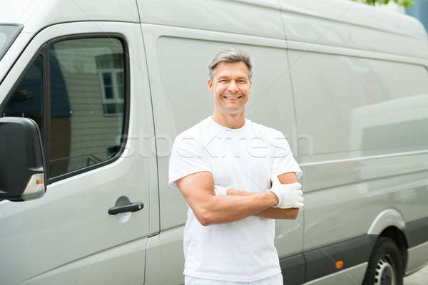 Painter With Arms Crossed In Front Of Van Stock photo © AndreyPopov