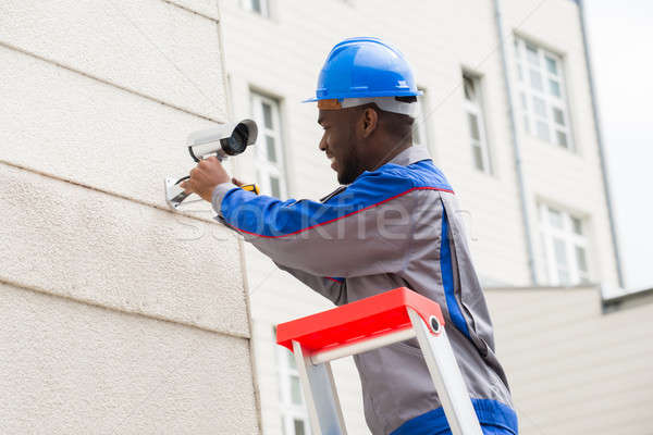 Technician Repairing Surveillance Camera Stock photo © AndreyPopov