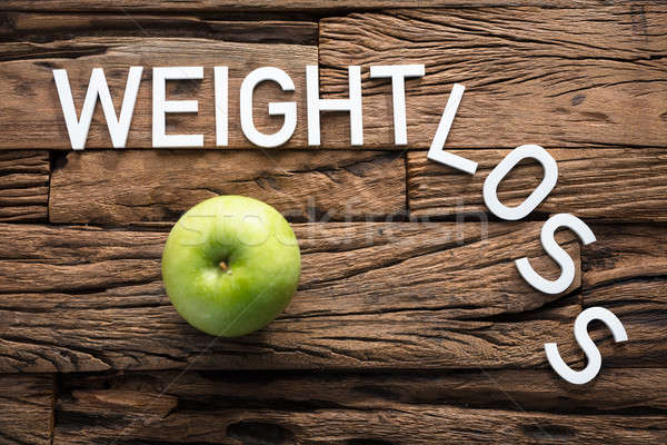 White Weight Loss Text On Wood Stock photo © AndreyPopov