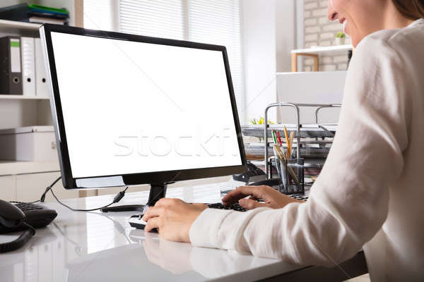 Businesswoman Working On Computer Stock photo © AndreyPopov