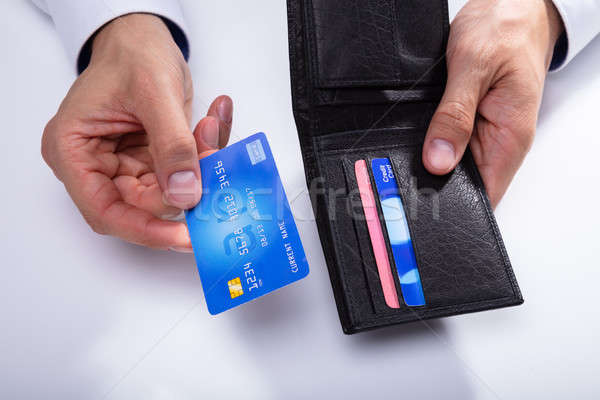 Person Removing Credit Card From Wallet Stock photo © AndreyPopov
