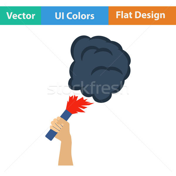 Football fans hand holding burned flayer with smoke icon Stock photo © angelp