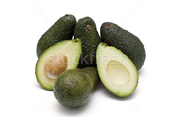 Fresh avocados isolated on a white background. Stock photo © angelsimon