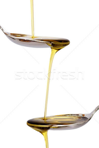 Tow spoons with olive oil. Stock photo © angelsimon