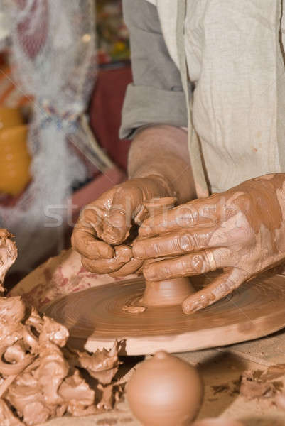Hands and clay. Stock photo © angelsimon