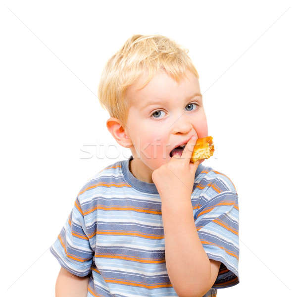 Cute pequeño nino comer delicioso cookie Foto stock © anmalkov