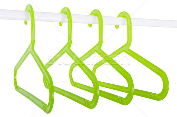 Green hangers on a rod isolated on white Stock photo © anmalkov