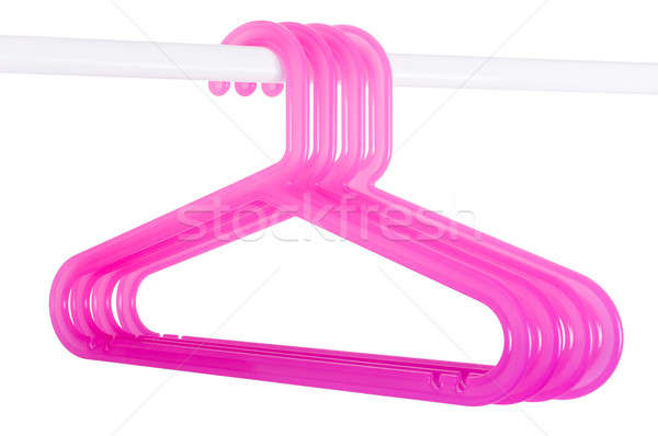 Pink hangers on a rod isolated on white Stock photo © anmalkov