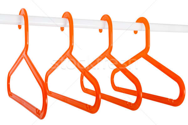Orange hangers on a rod isolated on white Stock photo © anmalkov
