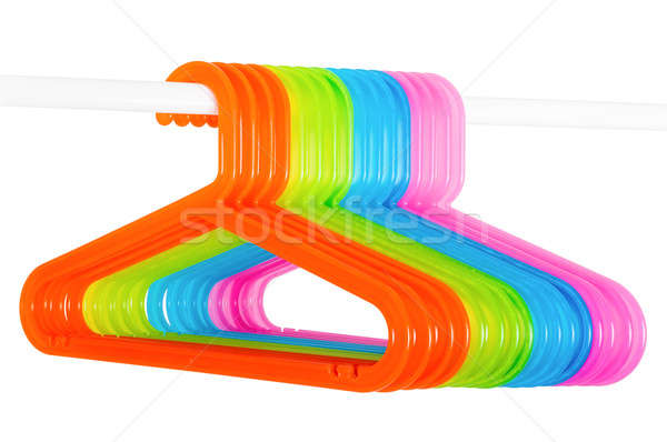 Colored hangers on a rod isolated on white Stock photo © anmalkov