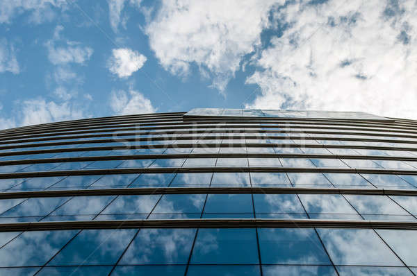 Сток-фото: стеклянное · здание · небе · отражение · облака · здании