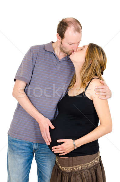 Szczęśliwy człowiek całując piękna kobieta w ciąży Zdjęcia stock © anmalkov