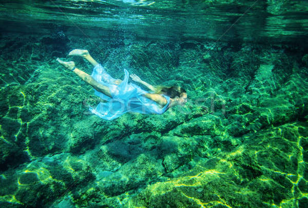 Pihenés tenger gyönyörű fiatal női úszik Stock fotó © Anna_Om