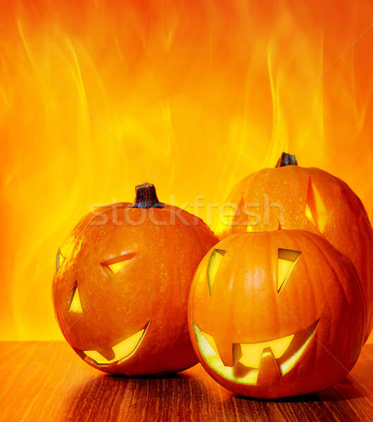 Halloween glühend Kürbisse hellen Feuer gelb Stock foto © Anna_Om