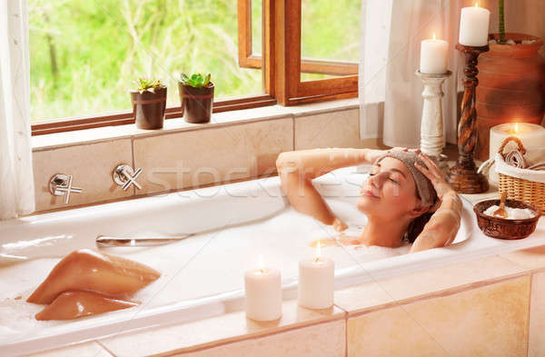 Woman relaxing at spa resort Stock photo © Anna_Om