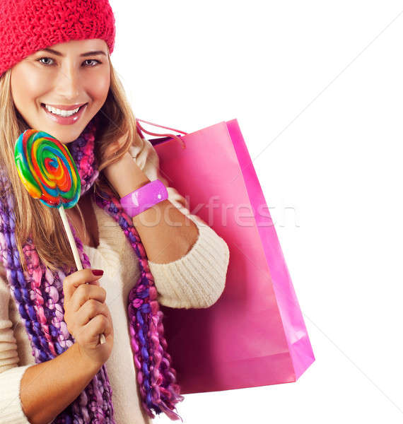 Pretty female with candy and paper bag Stock photo © Anna_Om