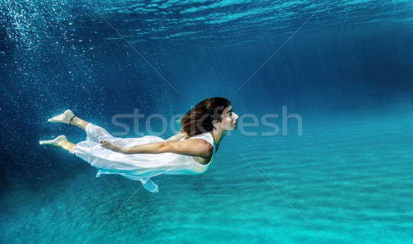 Stock foto: Schwimmen · Unterwasser · Mädchen · glücklich · tragen · stylish · Kleid