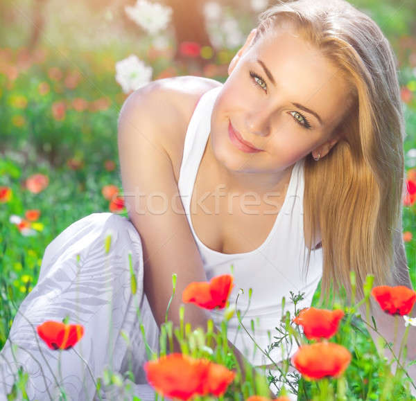 Stock fotó: Gyönyörű · lány · pipacs · virágmező · gyönyörű · fiatal · lány · ül
