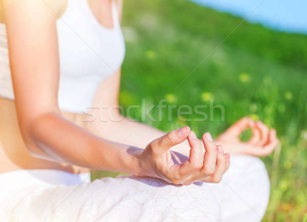 Doing yoga outdoors Stock photo © Anna_Om