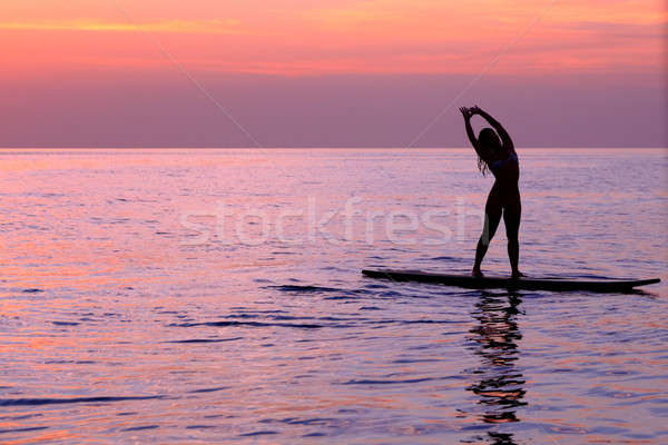 Nő jóga sziluett lány gyakorol egyensúlyoz Stock fotó © Anna_Om