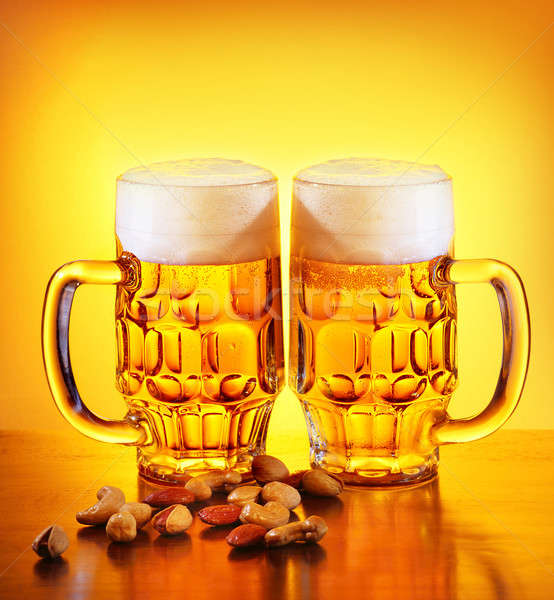 Bier Nüsse Glas kalten trinken isoliert Stock foto © Anna_Om