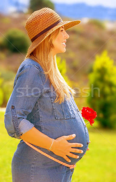 Expectant woman in the park Stock photo © Anna_Om