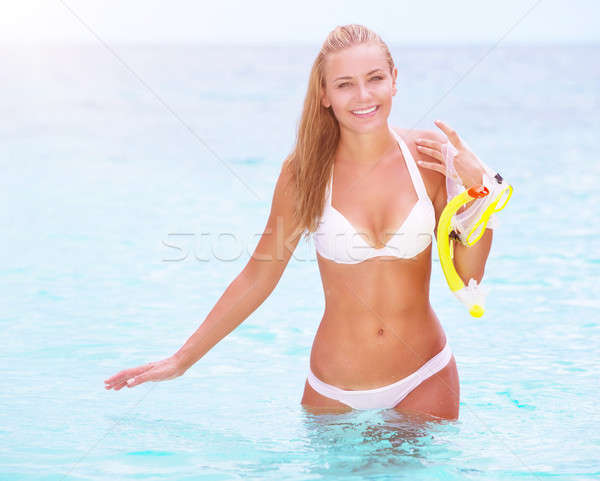 Happy female enjoying beach activities Stock photo © Anna_Om