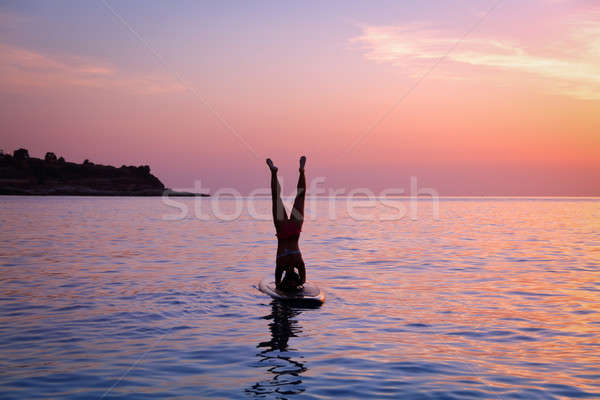 Woman doing yoga outdoors Stock photo © Anna_Om