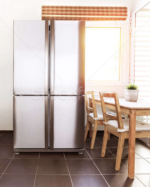 Lusso frigorifero acciaio cucina luminoso sole Foto d'archivio © Anna_Om
