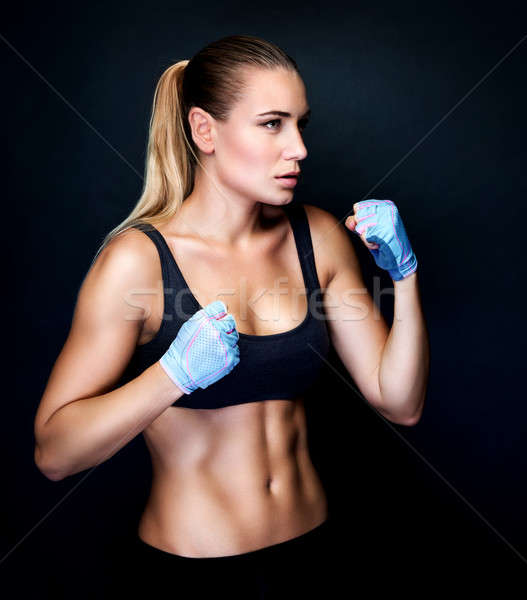 Boxer girl in action Stock photo © Anna_Om