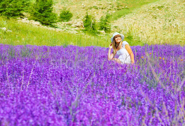 Beautiful woman on lavender meadow Stock photo © Anna_Om