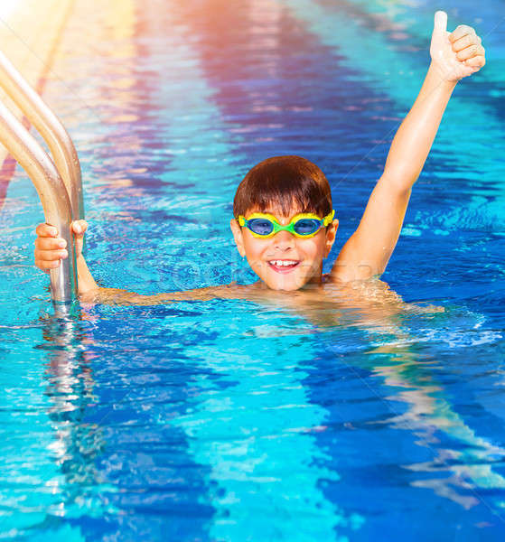 Stock photo: Little boy in the pool