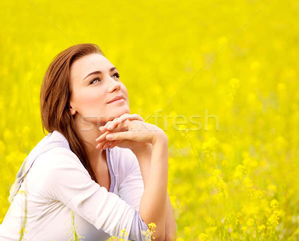 Cute female on yellow floral field Stock photo © Anna_Om