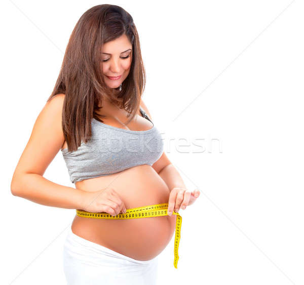 Mujer embarazada vientre retrato feliz aislado Foto stock © Anna_Om