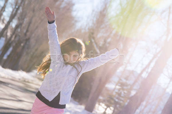 Little cheerful girl paying outdoors Stock photo © Anna_Om