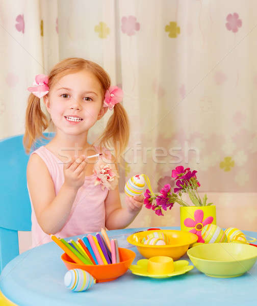 Little girl paint Easter eggs Stock photo © Anna_Om