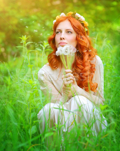 Dreamy girl with a dandelion bouquet Stock photo © Anna_Om
