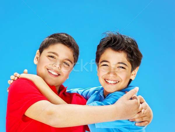 Happy cute boys over blue sky Stock photo © Anna_Om