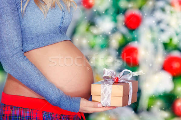 Terhes nő karácsony ajándék közelkép fotó has Stock fotó © Anna_Om