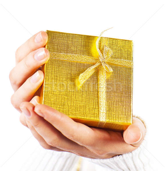 Golden gift in hands  Stock photo © Anna_Om