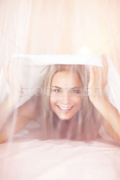 Joyful woman in the bed Stock photo © Anna_Om