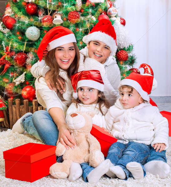Happy family in Christmas eve Stock photo © Anna_Om