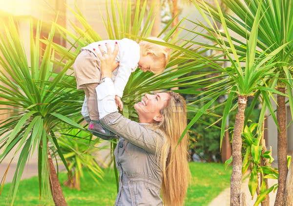 Cheerful mother playing with baby Stock photo © Anna_Om