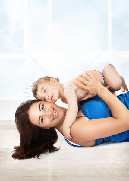 Joyful mother play with son Stock photo © Anna_Om