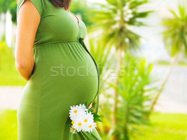 Terhes nő élvezi nyár park testrész boldog Stock fotó © Anna_Om