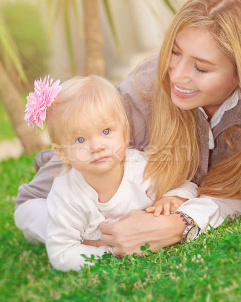 Happy family in the park Stock photo © Anna_Om