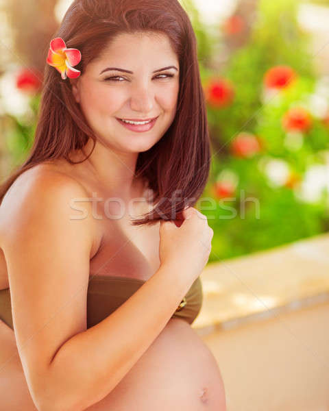 Stock photo: Happy pregnant girl on the beach resort