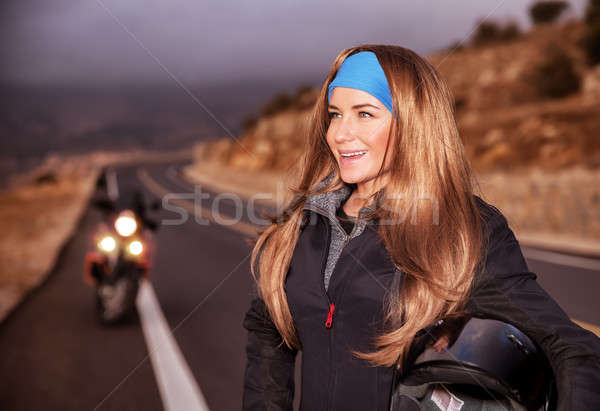 Nice young biker on the road Stock photo © Anna_Om