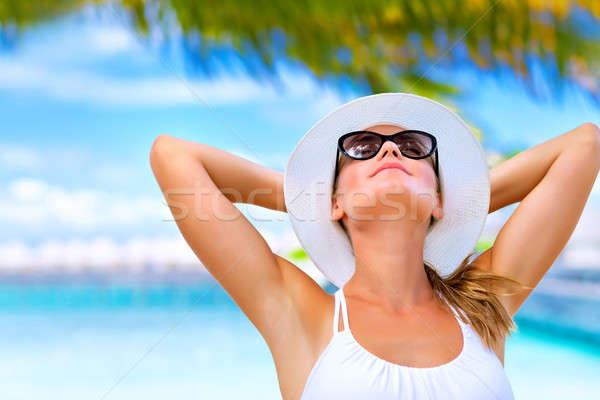 Stock photo: Taking sunbath on the beach